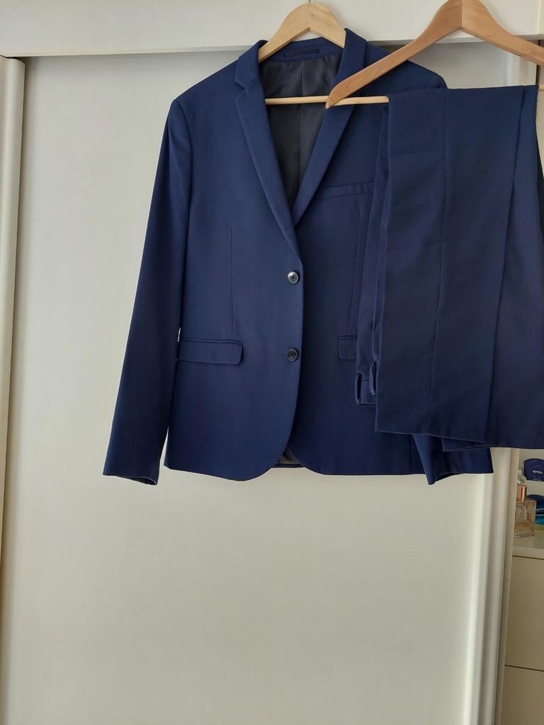 Mooi pak, blauw, WE skinny fit maat 26, Kleding | Heren, Kostuums en Colberts, Ophalen of Verzenden, Zo goed als nieuw, Maat 46 (S) of kleiner