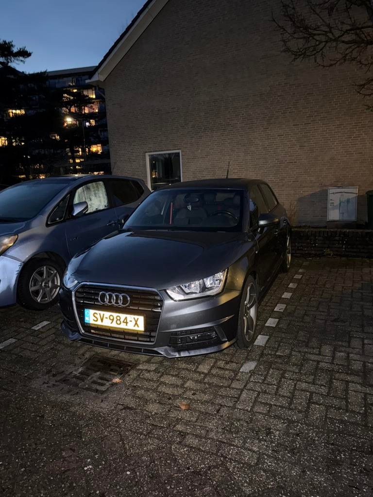 Audi A1 Sportback 1.0 TFSI 70 kW S-line | 2015 | Grijs, Auto's, Voorwielaandrijving, Zwart, 95 pk, 23 km/l