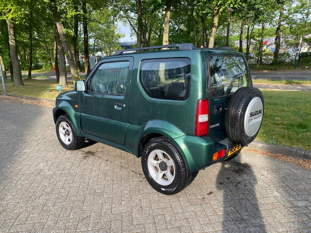 Suzuki Jimny 1.3 4WD 2009 Groen airco, Auto's, Suzuki, Stof, 40 €/maand, 4 stoelen, Particulier