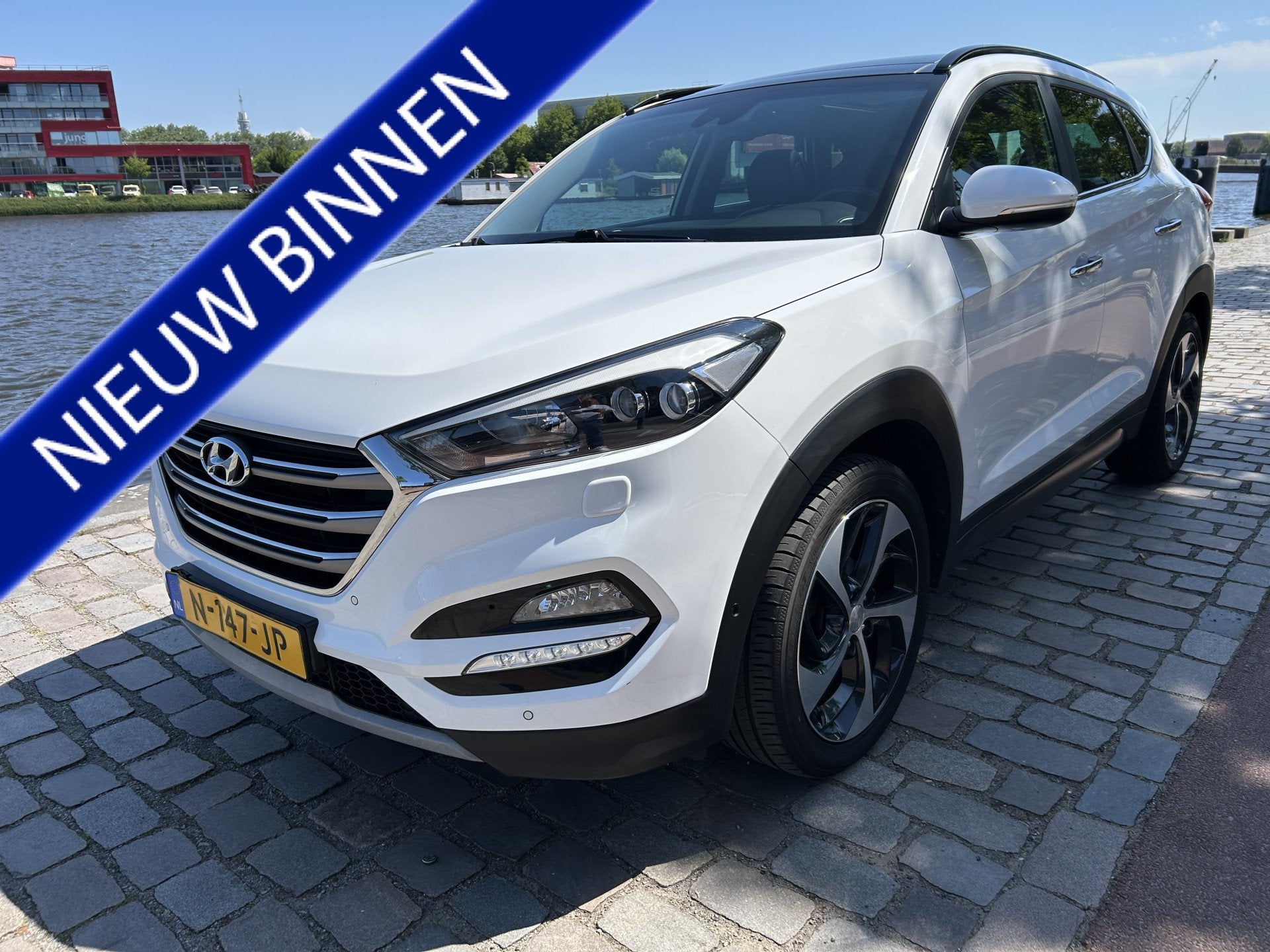 Hyundai Tucson 1.6 T-GDi Premium 4WD automaat leer airco/ecc, Gebruikt, 4 cilinders, Wit, Leder