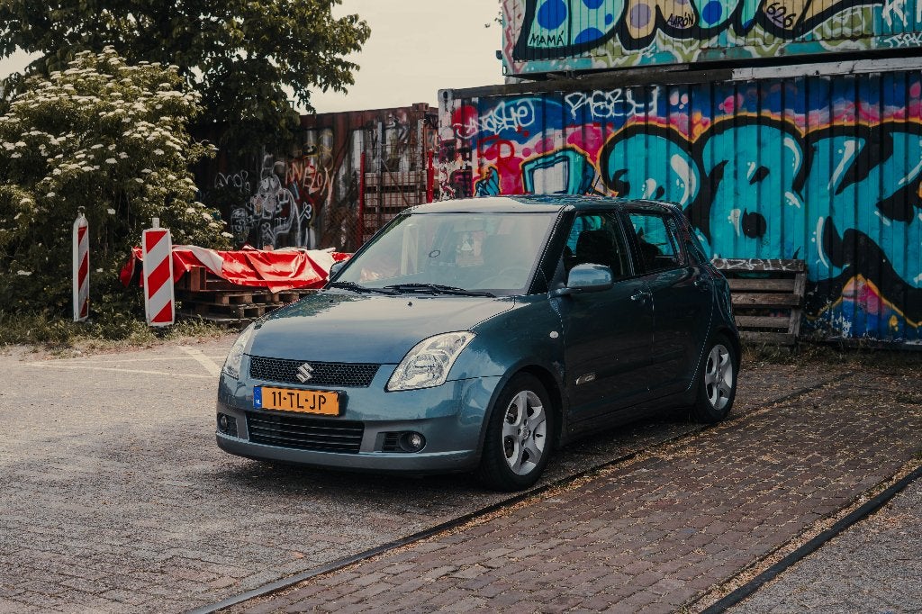 Suzuki Swift 1.3 5DRS 2006 Grijs, Voorwielaandrijving, Stof, 40 €/maand, 965 kg