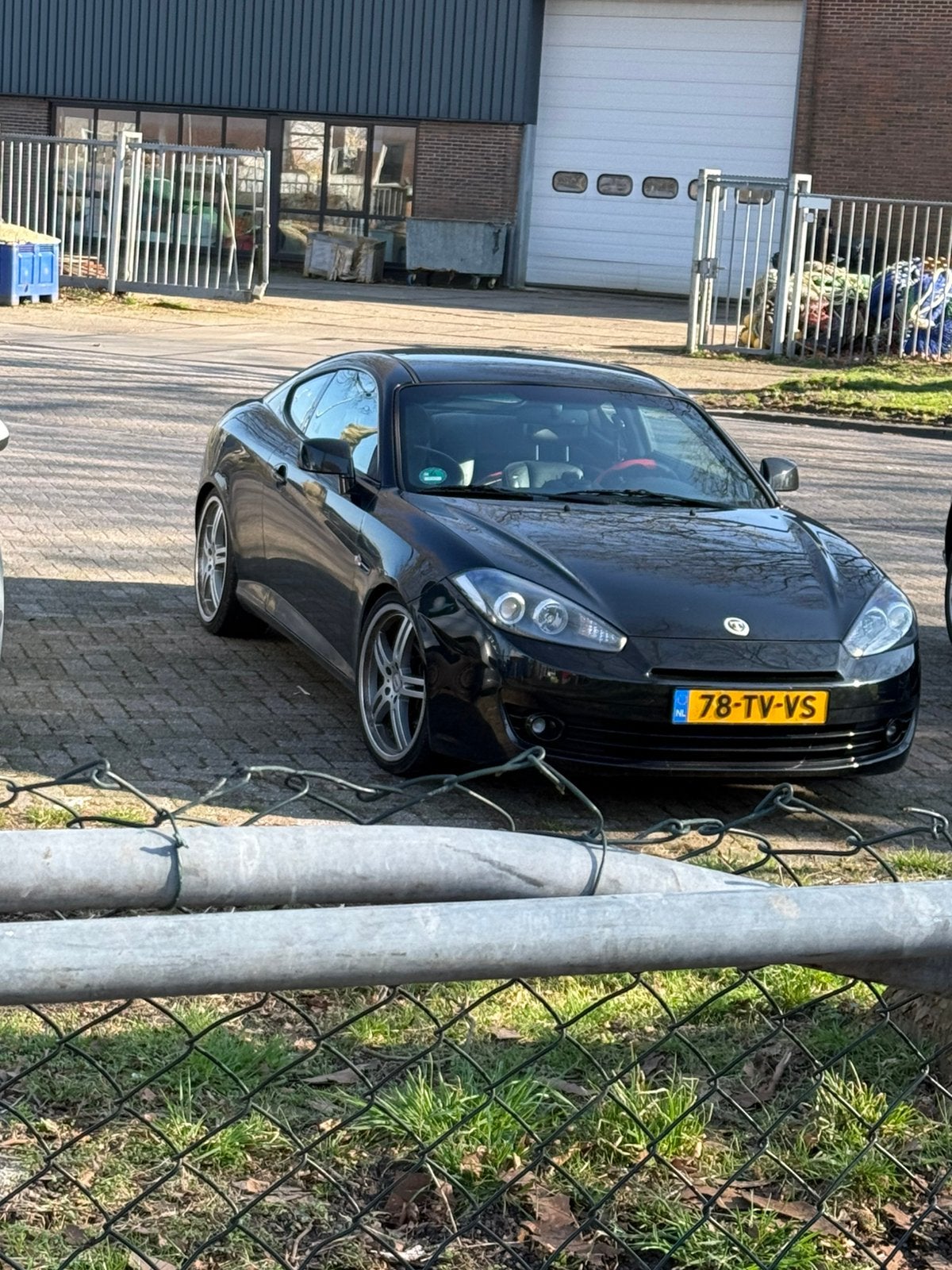 Hyundai Coupé 2.0 2007 Zwart, Auto's, 4 stoelen, Leder en Stof, Zwart, Origineel Nederlands