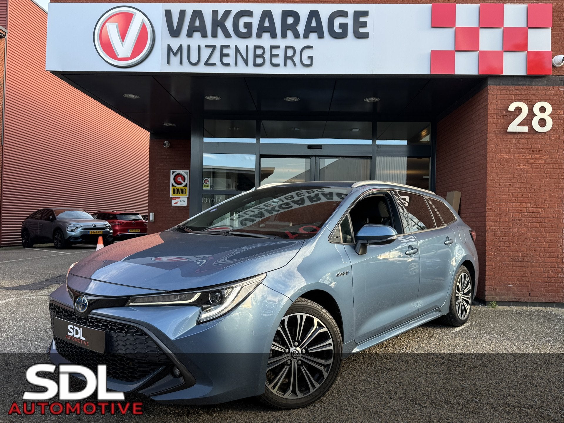 Toyota Corolla Touring Sports 1.8 Hybrid Dynamic // CAMERA /, Stof, Gebruikt, Zwart, Blauw