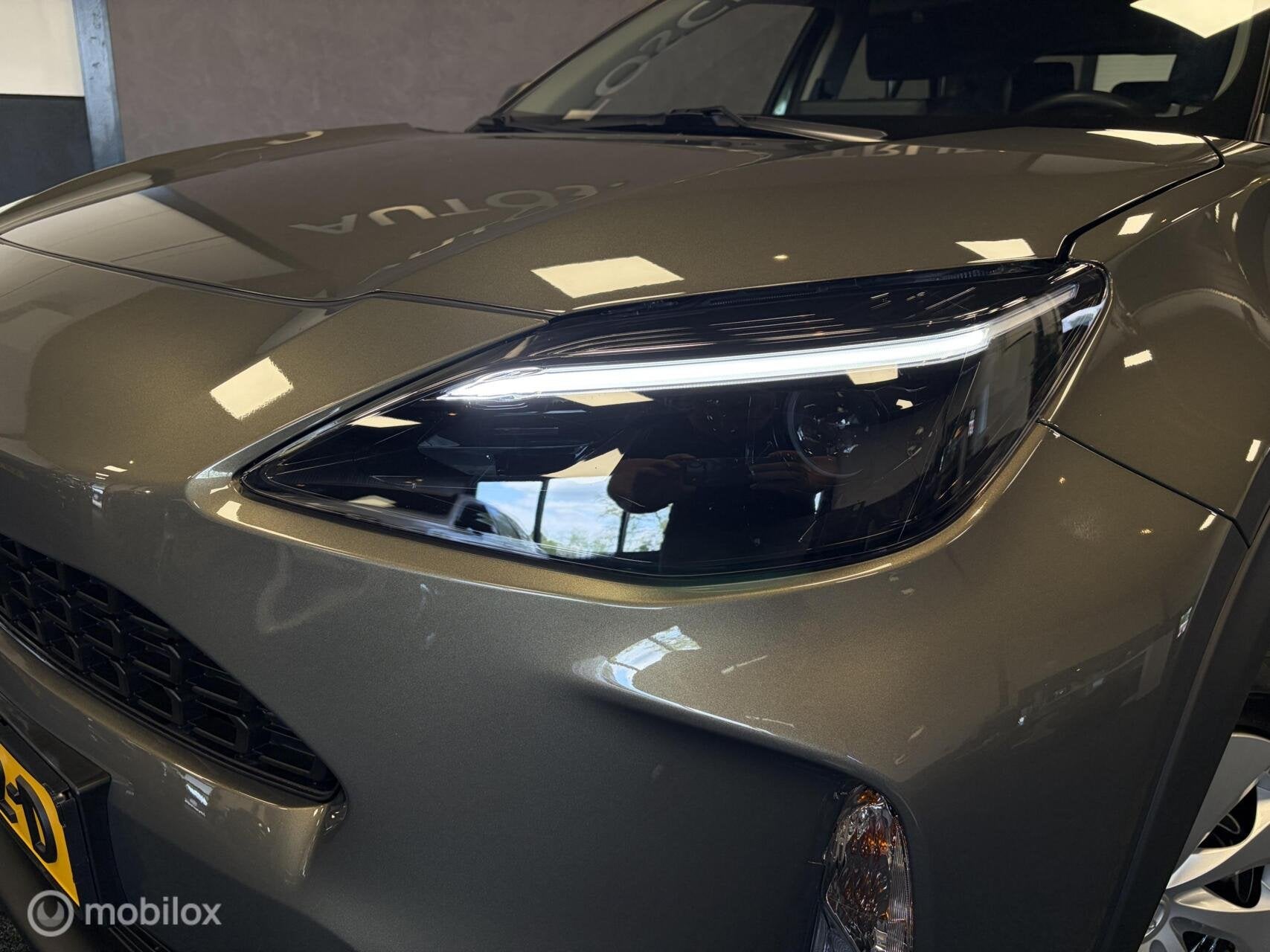 Toyota Yaris Cross 1.5 Hybrid Active Limited LED / CARPLAY /, Auto's, Stof, Gebruikt, Bruin, 116 pk