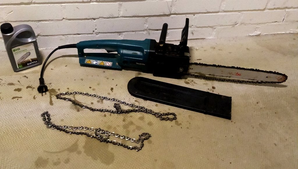 Makita UC4000A elektrische kettingzaag 230V, Doe-het-zelf en Verbouw, Ophalen, Gebruikt, Kettingzaag, Makita