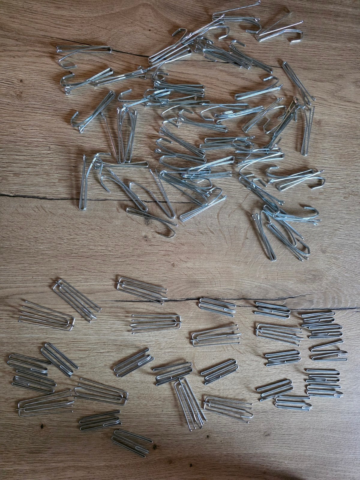 gordijnhaken plooiband, Ophalen