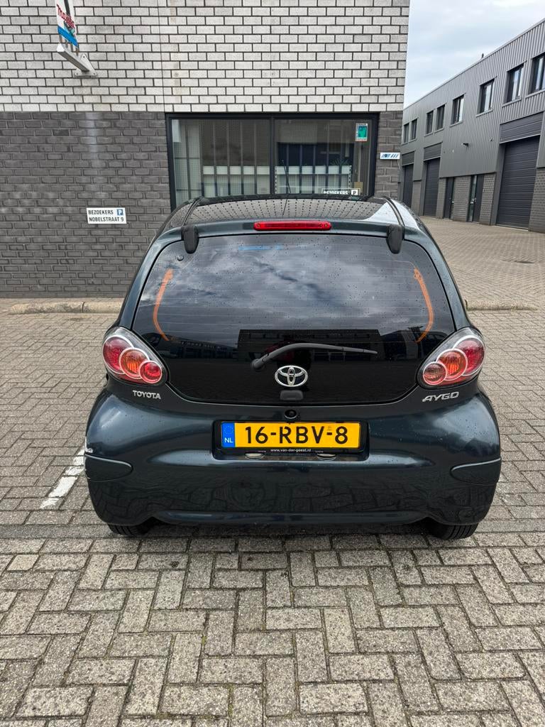 Toyota Aygo 1.0 12V Vvt-i 5DRS 2011 Groen, Auto's, Toyota, Voorwielaandrijving, 4 stoelen, 68 pk, Origineel Nederlands