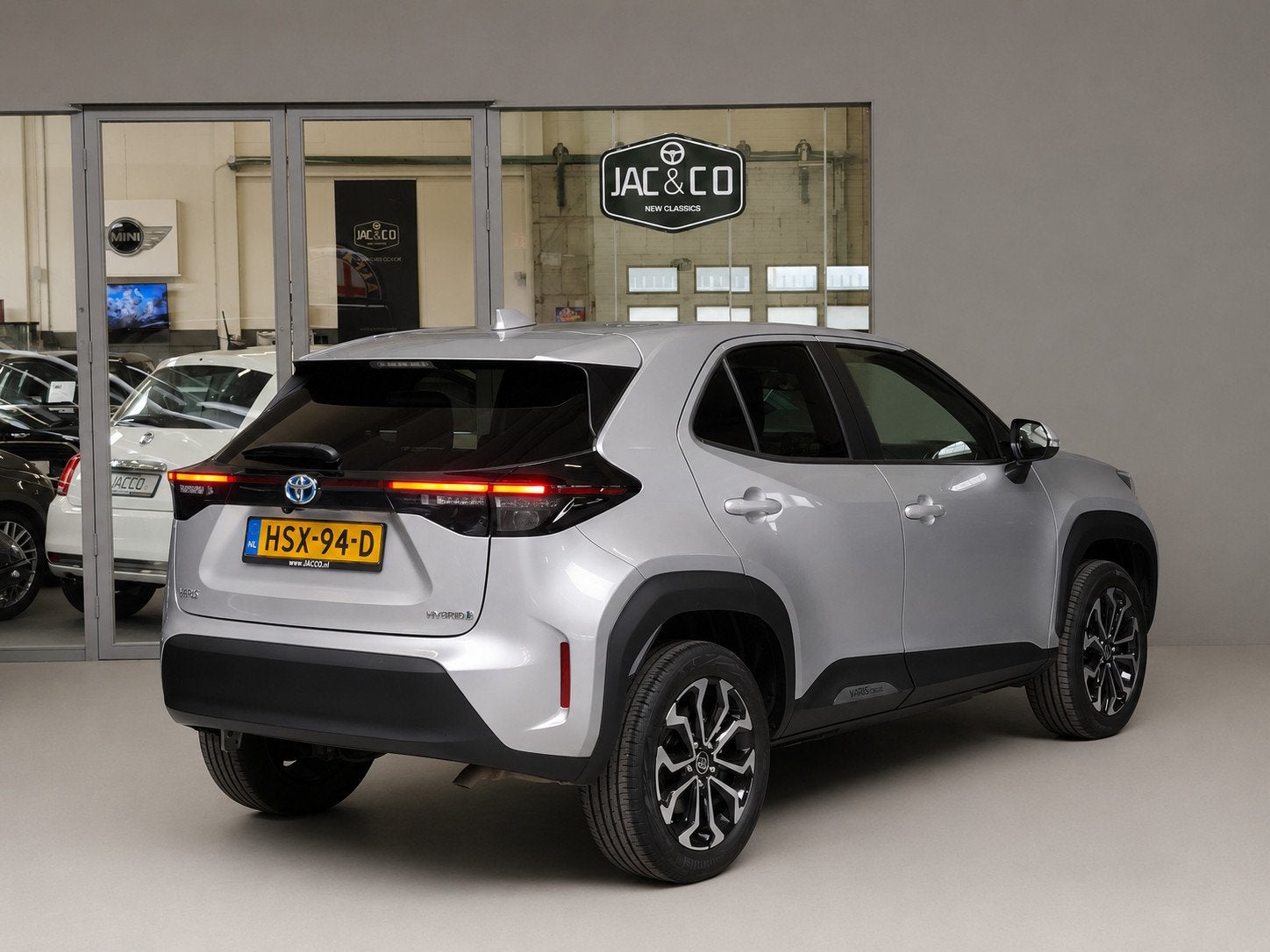 Toyota Yaris Cross 1.5 Hybrid First Edition Full map Navi -, Stof, Bedrijf, 115 pk, Hybride Elektrisch/Benzine