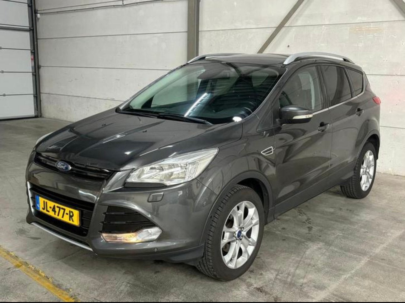 Ford Kuga 1.5 Ecoboost 120pk 2WD 2016 Grijs, Auto's, Zwart, 4 cilinders, Leder en Stof, Origineel Nederlands