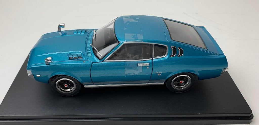 Whitebox 1:24 Toyota Celica LB 2000 GT turkoois met 2 openin, Hobby en Vrije tijd, Modelauto's | 1:24, Overige merken, -, Nieuw