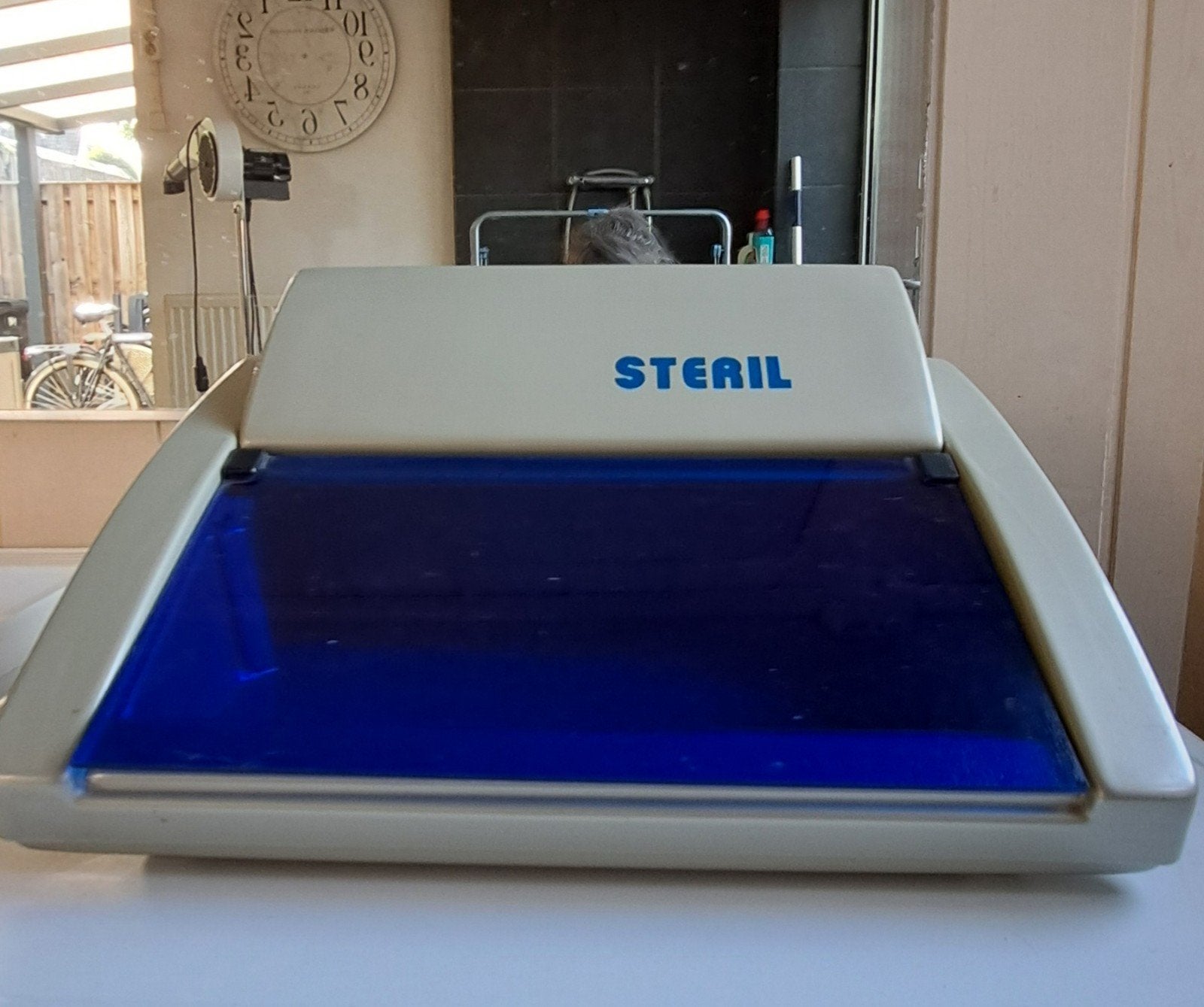 sterelisator voor trimsalon, Ophalen