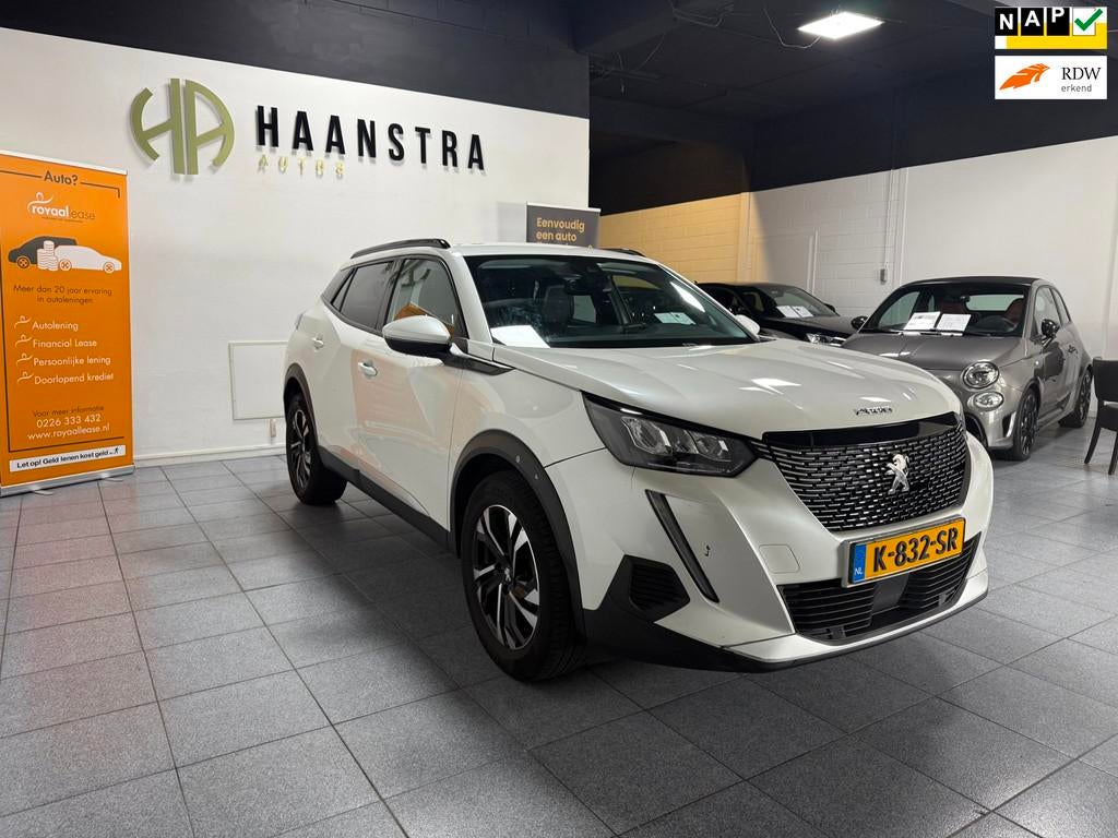 Peugeot 2008 1.2 PureTech Allure Navigatie Apple-Carplay NL, 101 pk, Gebruikt, 1199 cc, Leder en Stof