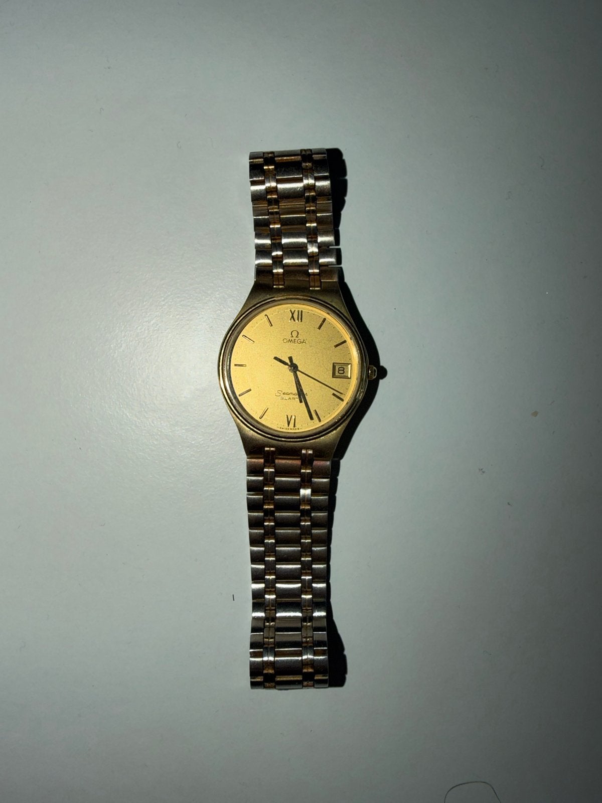 Omega Seamaster Quartz Horloge - Goudkleurig met Stalen Band, Staal, Gebruikt, Polshorloge, Ophalen of Verzenden