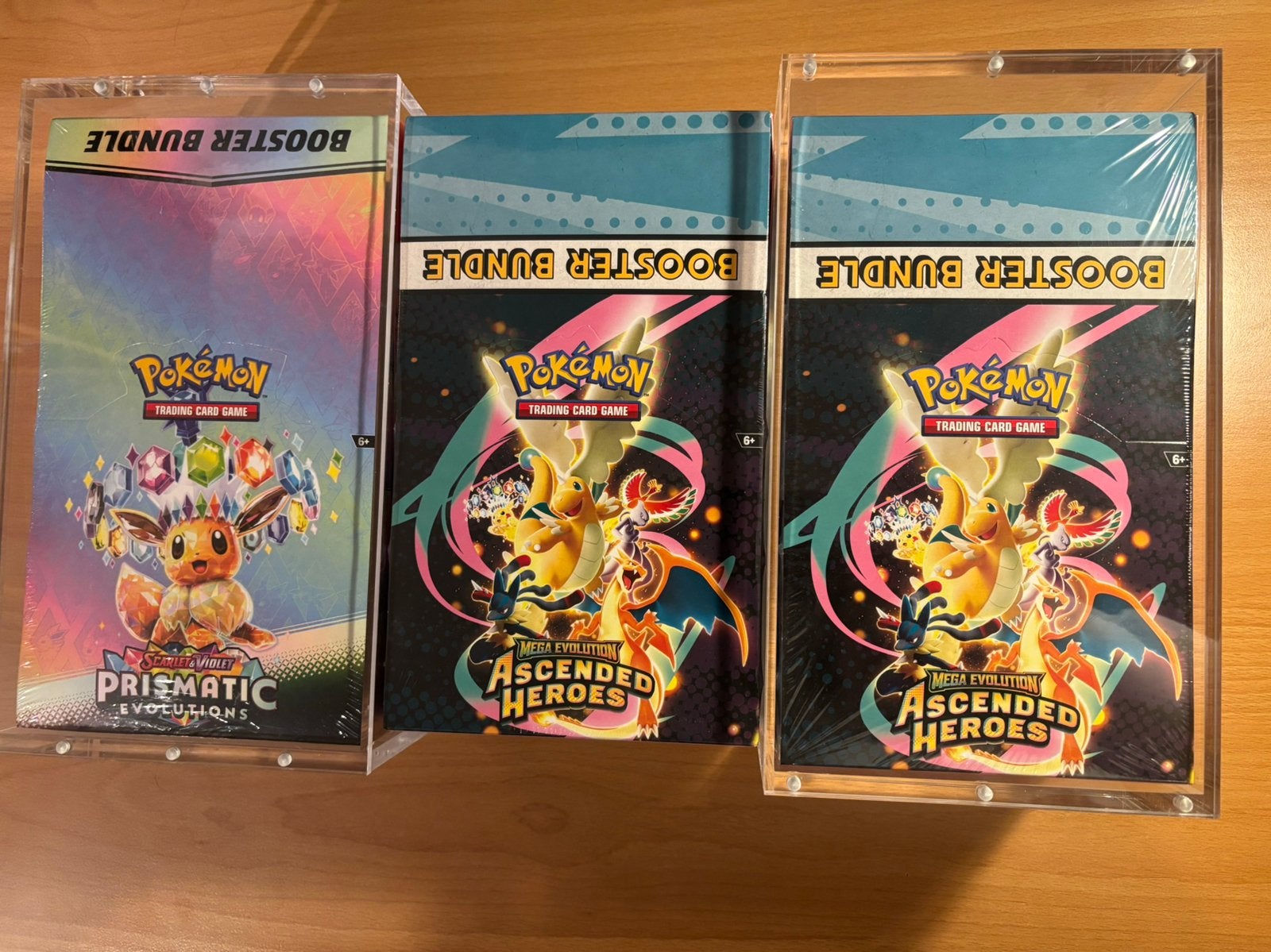 Ascended heroes en prismatic evolutions bundel display, Ophalen of Verzenden, Zo goed als nieuw