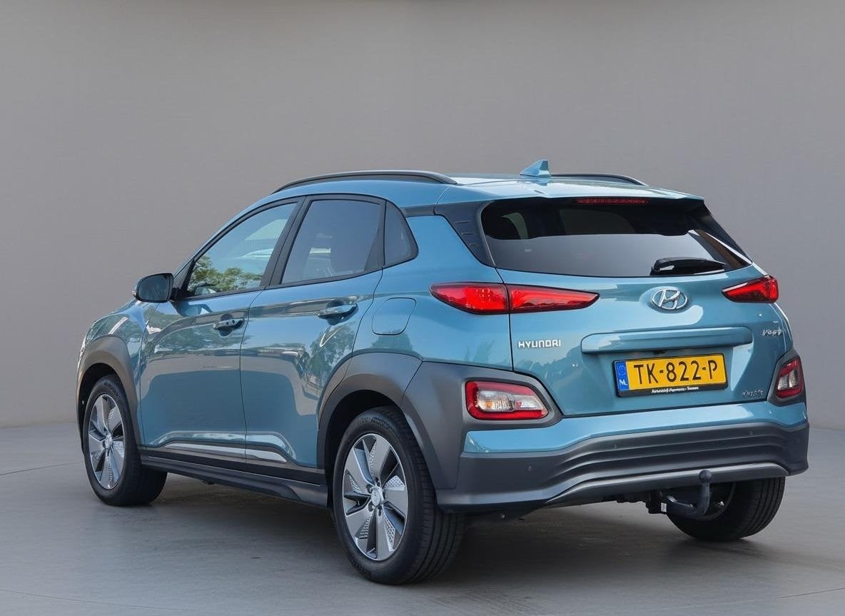 Hyundai Kona EV Premium 64kWh | SOH 89% | Leder | Stoelventi, Gebruikt, Adaptive Cruise Control, Blauw, 630 min