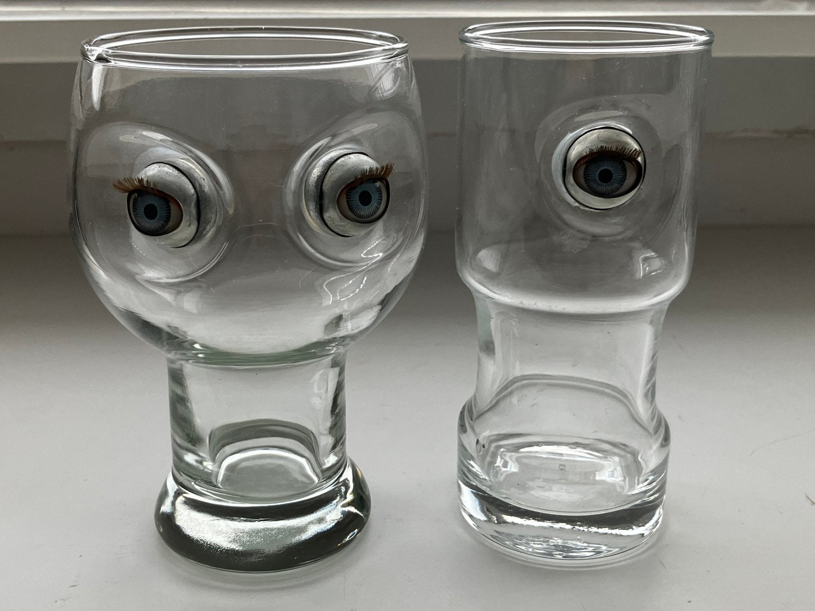 2x vintage grappige drinkglazen met bewegende oogen, Ophalen of Verzenden, Gebruikt, Overige typen