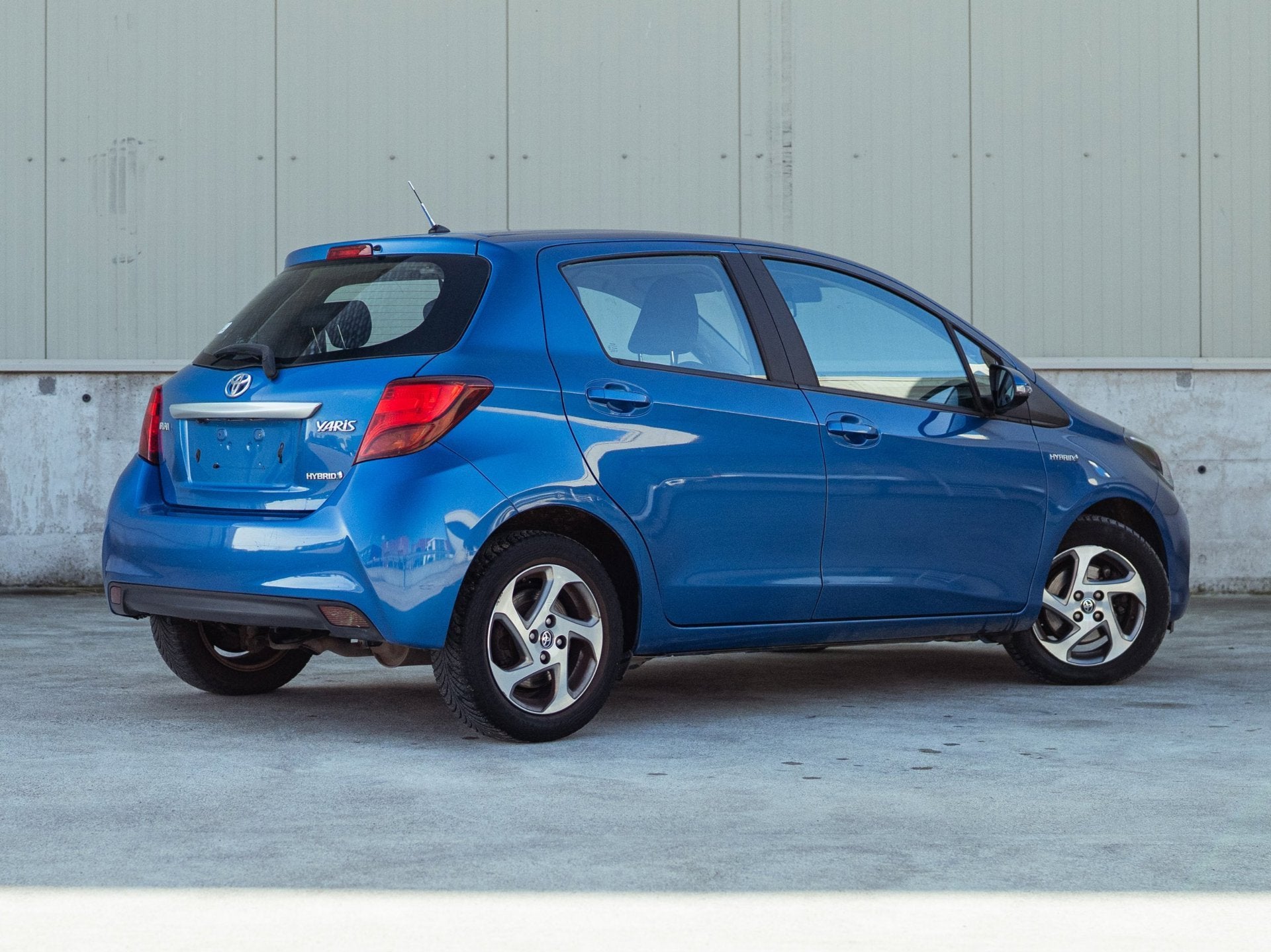 Toyota Yaris 1.5 Hybrid Aspiration, Stof, Gebruikt, Zwart, Blauw