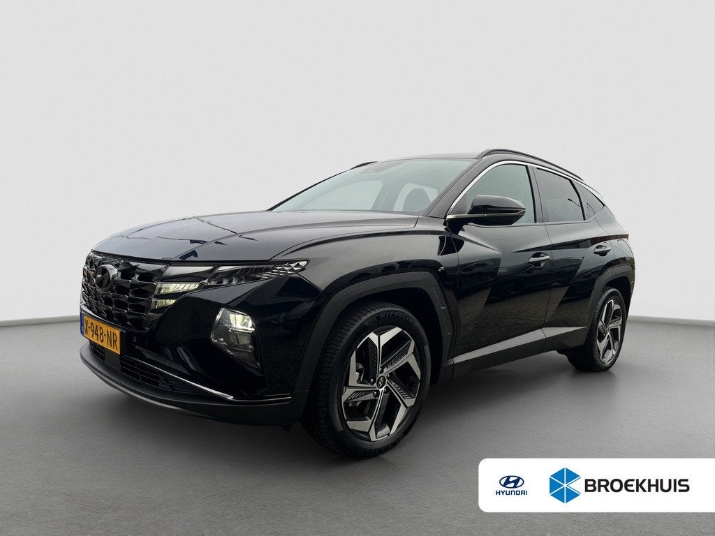 Hyundai TUCSON 1.6 T-GDI 265pk PHEV Premium 4WD, Auto's, Gebruikt, Zwart, Bedrijf, Vierwielaandrijving