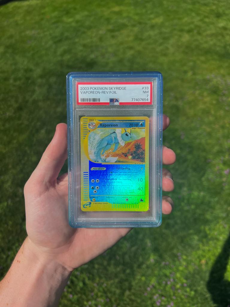 Vaporeon 33 Reverse Holo Pokemon Kaart PSA 7, Ophalen of Verzenden, Nieuw, Losse kaart, Foil