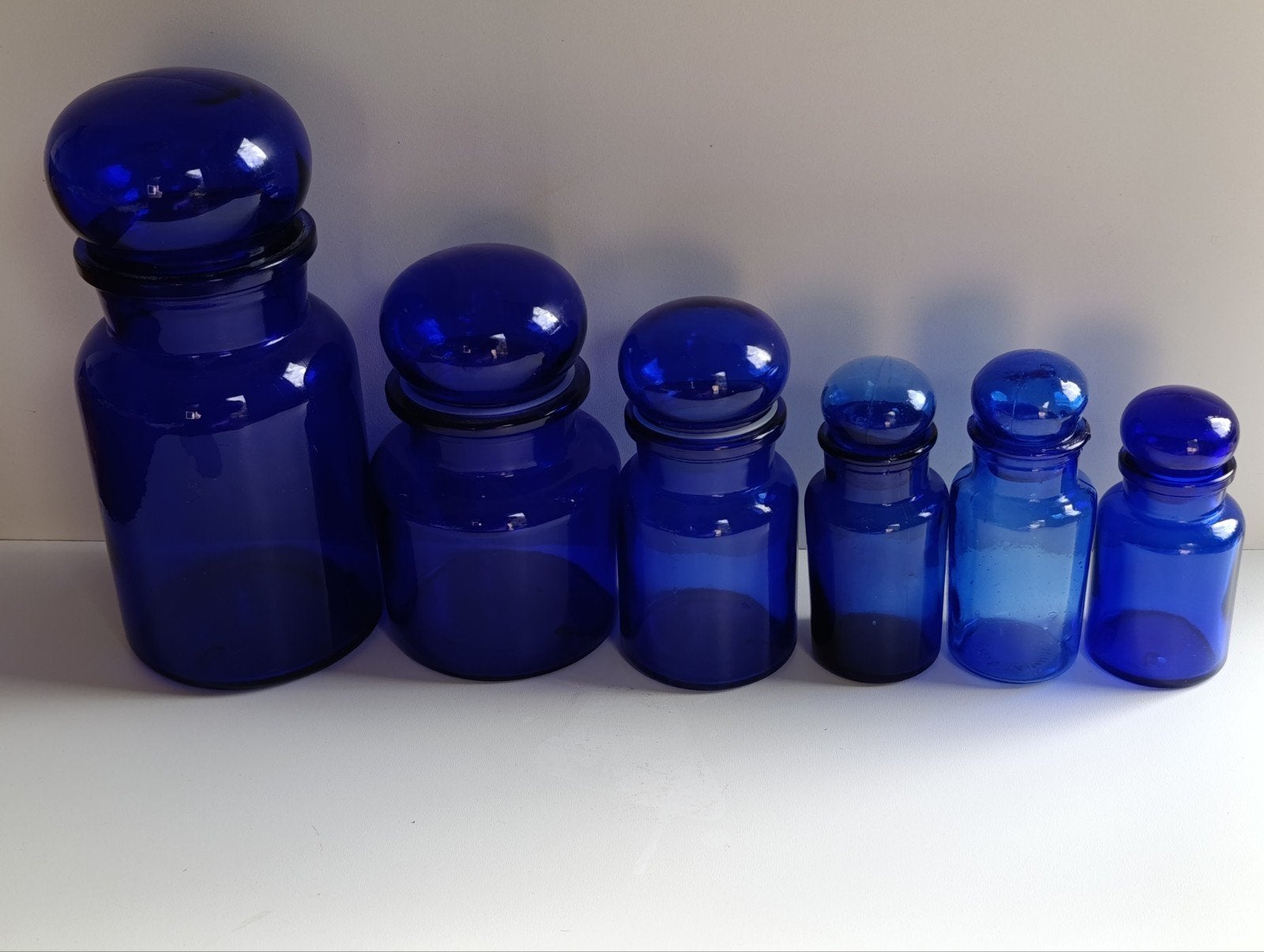 6 apothekerspotten met stolpdop , blauw . ~vintage ~, Ophalen of Verzenden, Voorraadpot, Glas, Gebruikt