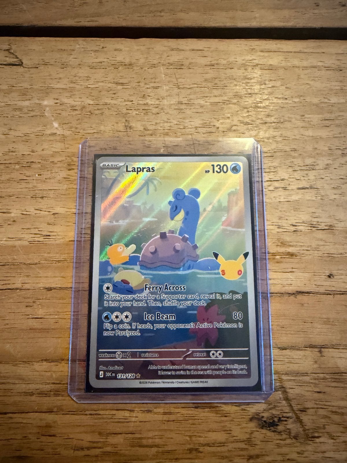 Lapras Pokémon Kaart 131/128 - 30th Anniversary, Ophalen of Verzenden, Zo goed als nieuw, Losse kaart