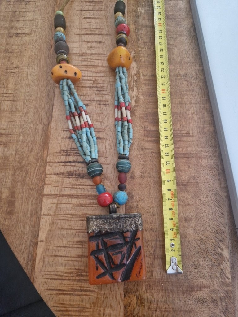 Etnische kralenketting met hanger van barnsteen., Ophalen of Verzenden