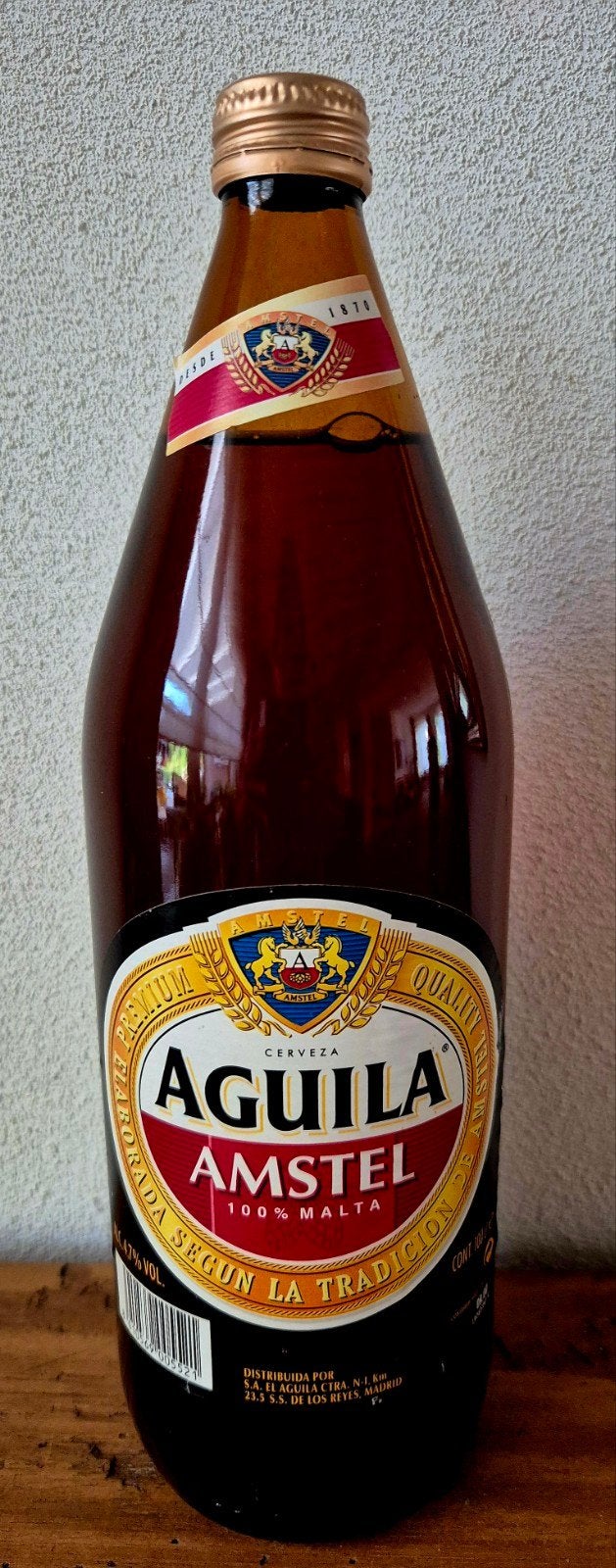 1 Ltr bruine glazen fles Águila Amstel bier SPANJE. verzamel, Verzamelen, Biermerken, Ophalen of Verzenden, Amstel