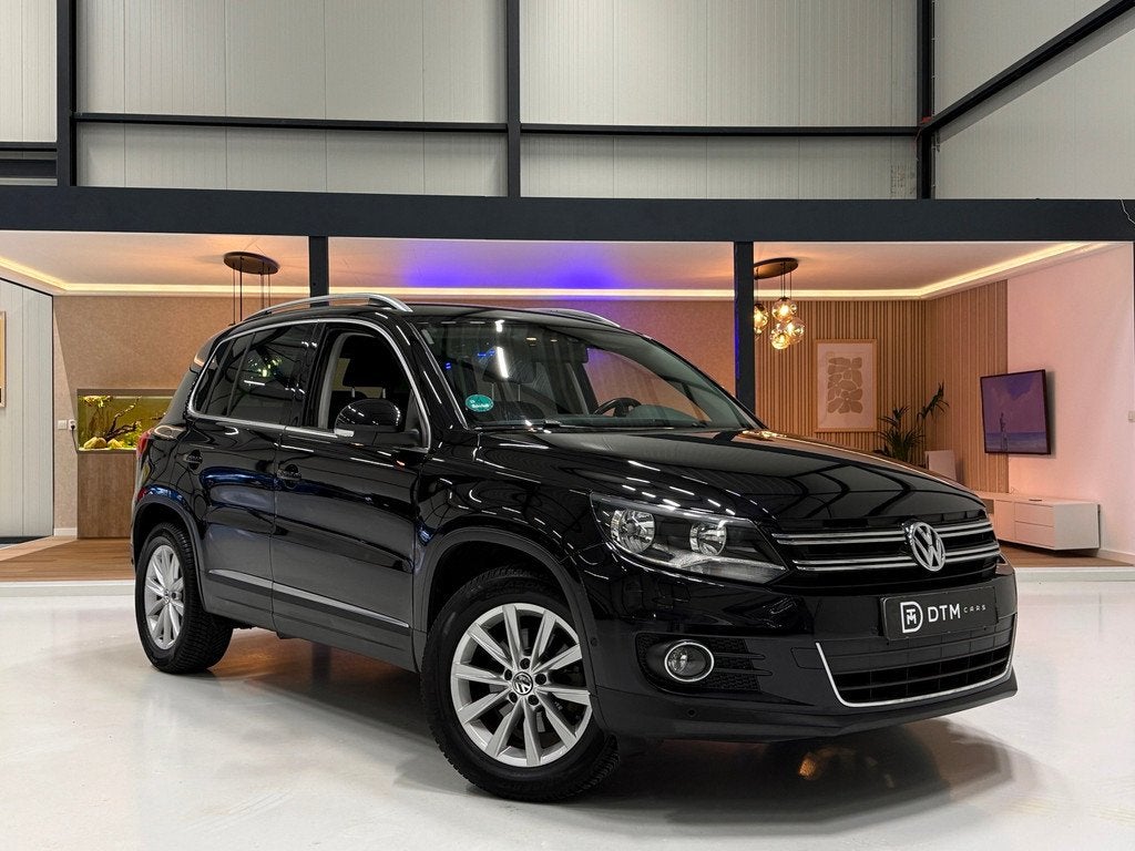 Volkswagen Tiguan 1.4 TSI Sport&Style Aut. | Navigatie | Car, Auto's, 15 km/l, 4 cilinders, 150 pk, Zwart