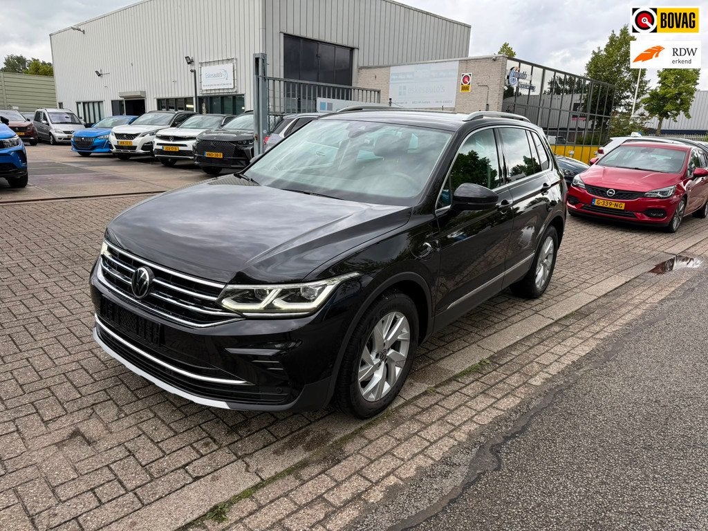 Volkswagen Tiguan 1.4 TSI eHybrid Business+ 245PK Automaat i, Auto's, Volkswagen, 1716 kg, 4 cilinders, Alcantara, Zwart
