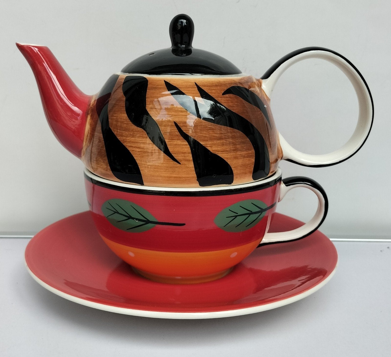 Kleurrijke tea-for-one set, Ophalen of Verzenden, Porselein, Overige stijlen, Kop(pen) en/of Schotel(s)