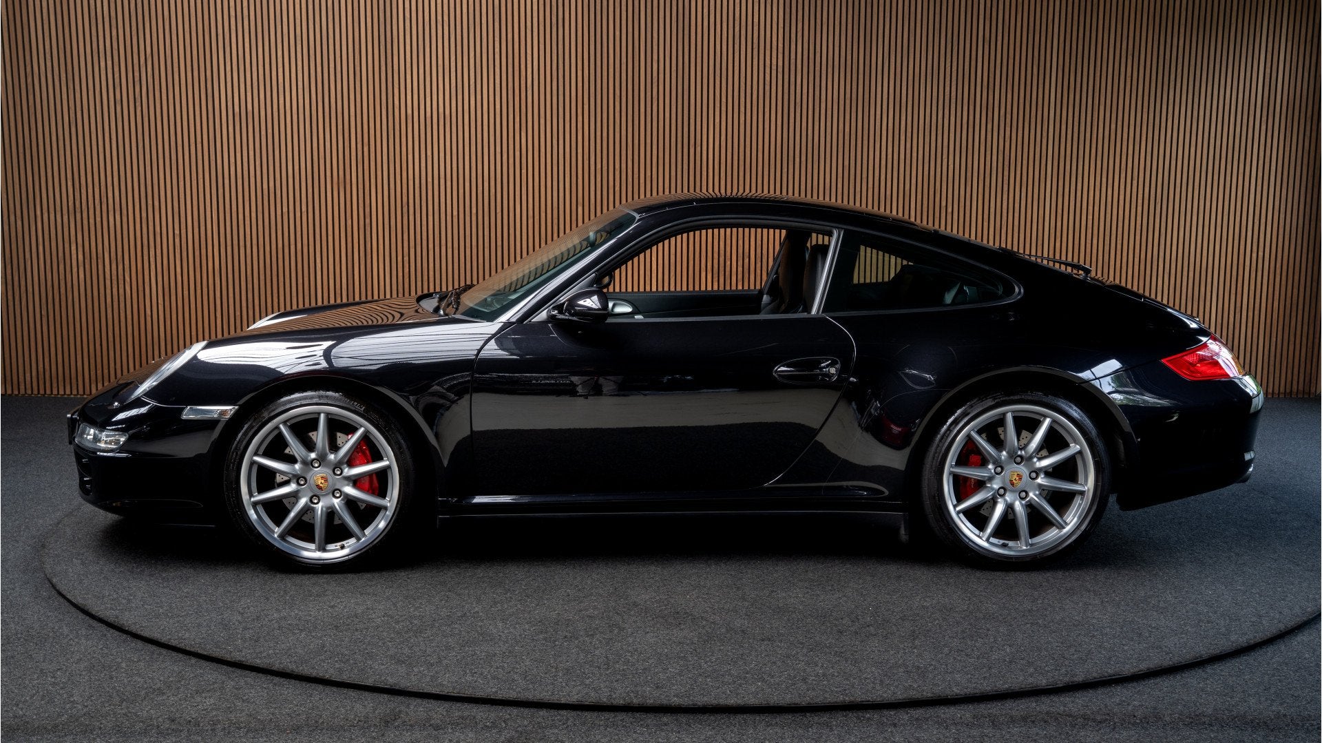 Porsche 911 3.8 Carrera 4S Open dak Bose Alcantarahemel Navi, Auto's, Automaat, Gebruikt, Zwart, 4 stoelen