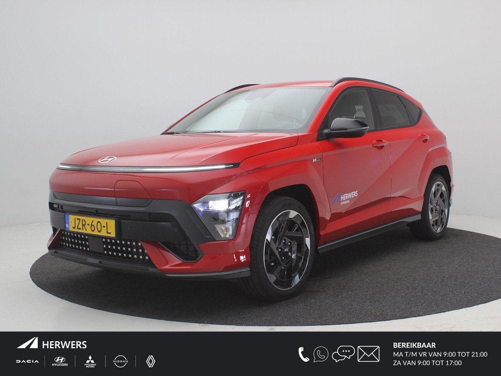 Hyundai KONA Electric N Line Business 64.8 kWh / Navigatie /, Auto's, Hyundai, Stof, 750 kg, Automatische klimaatregeling, Origineel Nederlands