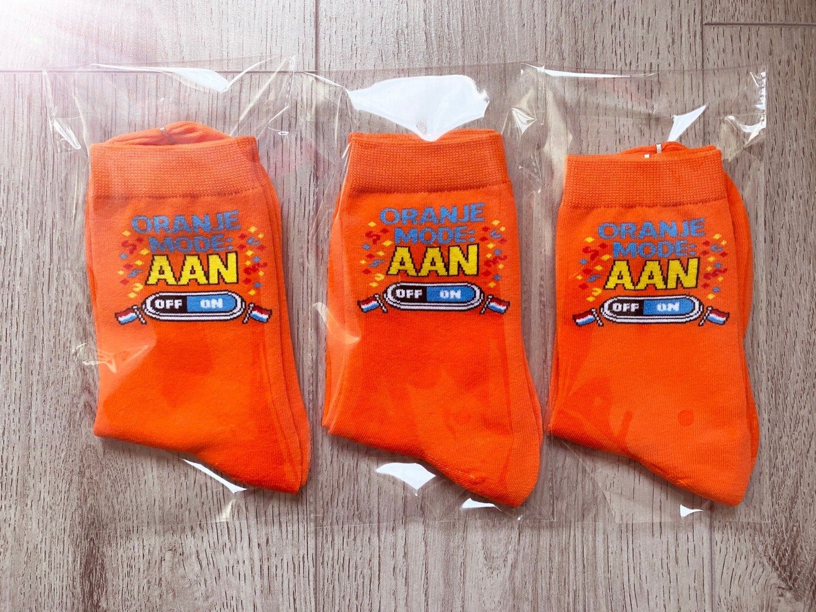 Doos met circa 95 nieuwe WK sokken - Oranje Mode Aan!, Sokken en Kniesokken, Nieuw, Ophalen of Verzenden, Onbekend