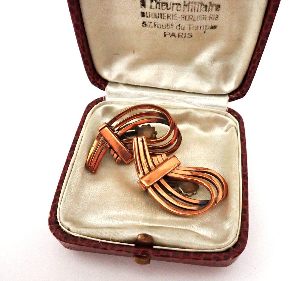 Vintage koperkleurige oorclips in strikdesign, Overige materialen, Overige kleuren, Verzenden, Zo goed als nieuw