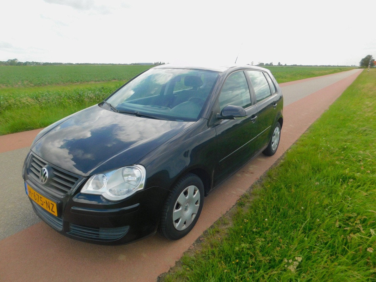 Volkswagen Polo 2008 - lage kilometerstand!, Auto's, Volkswagen, 40 €/maand, Zwart, 4 cilinders, Zwart