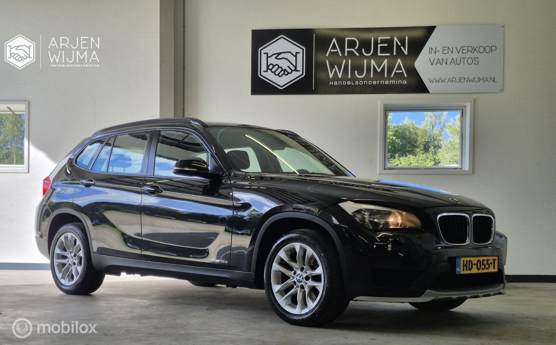 BMW X1 sDrive18d High Executive|Automaat|Stoelverwarming, Auto's, Euro 5, Zwart, Zwart, Bedrijf