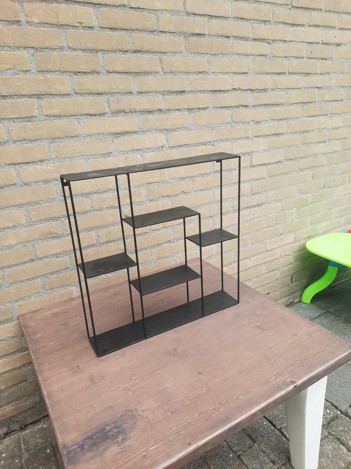 Zwart metalen wandrek / decoratierek, Huis en Inrichting, Ophalen of Verzenden, Zo goed als nieuw