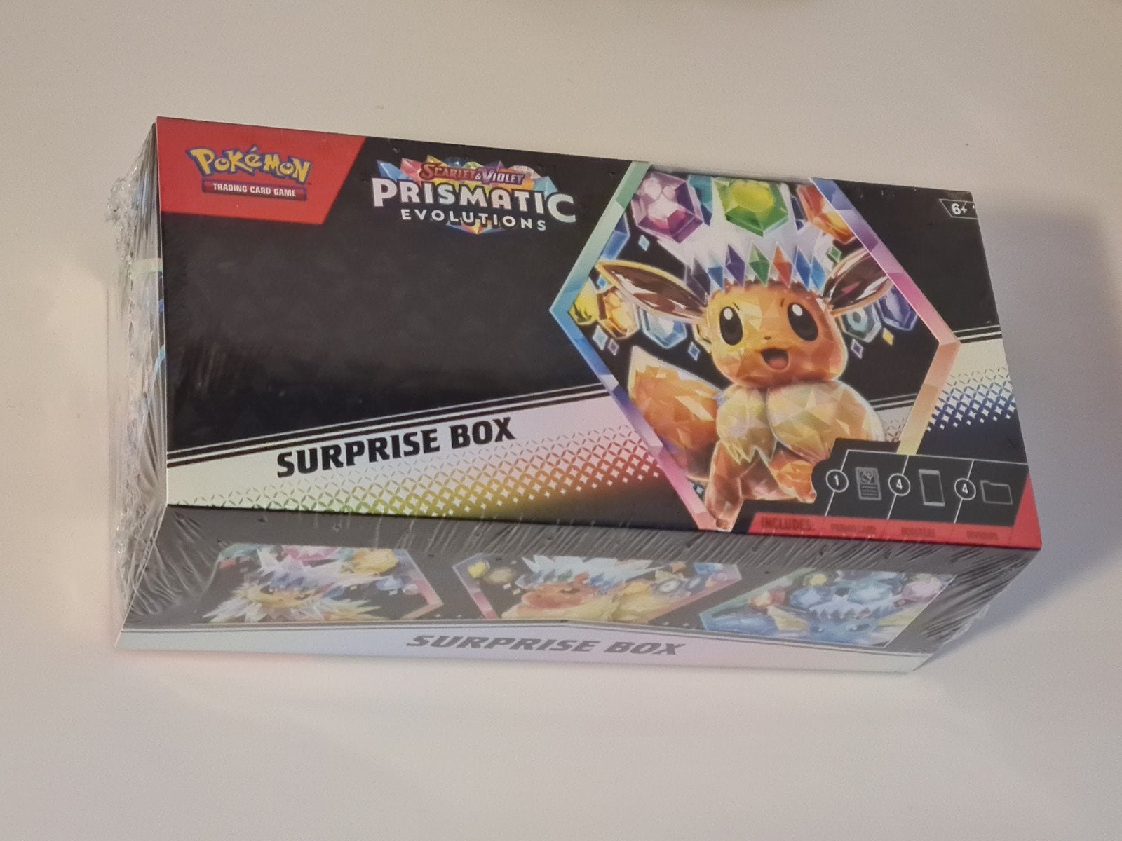 Pokémon Scarlet & Violet Prismatic Evolutions Surprise Box, Ophalen, Nieuw, Overige typen, Foil