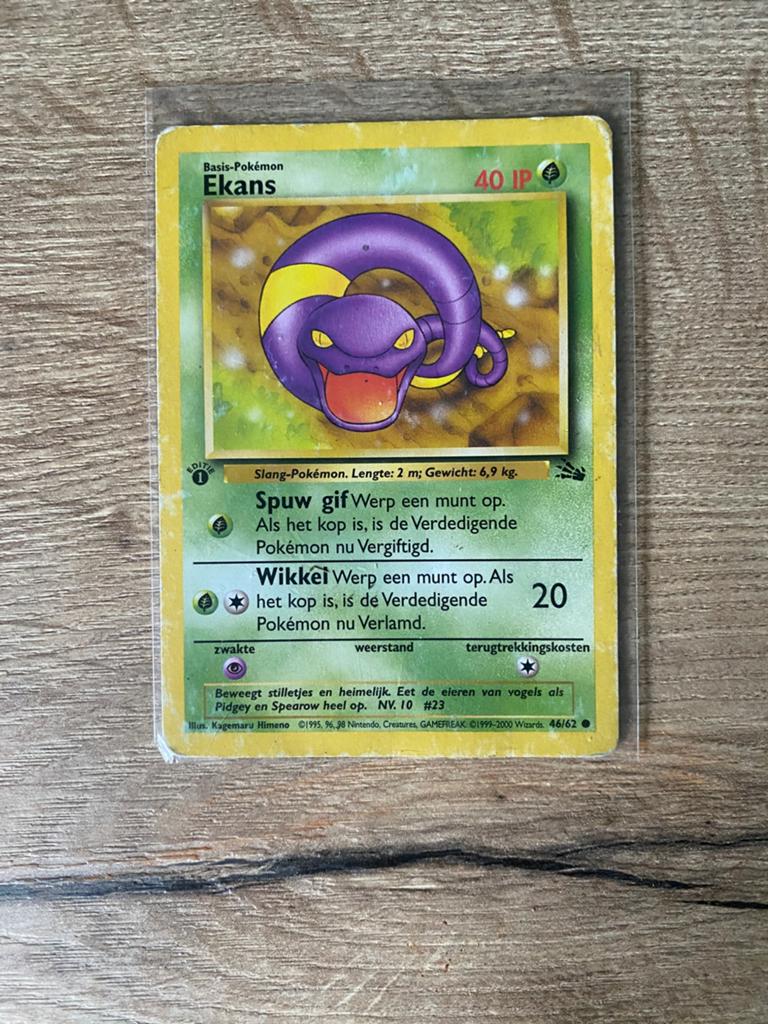 Ekans 1995 1e editie  Fossil (Nederlands), Hobby en Vrije tijd, Verzamelkaartspellen | Pokémon, Ophalen of Verzenden, Gebruikt