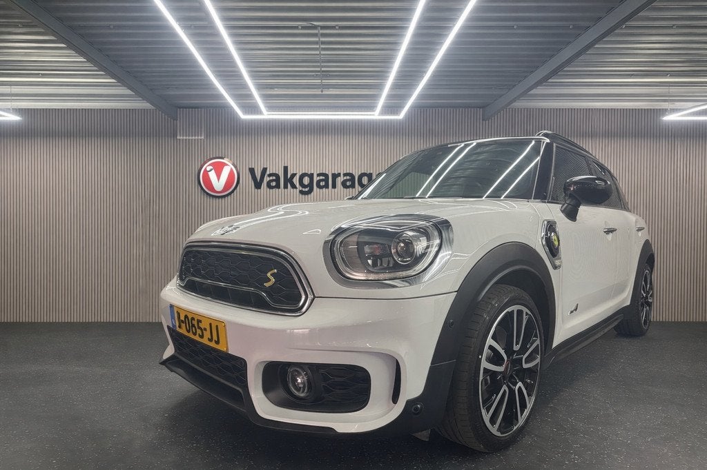 Mini Countryman 1.5 Cooper S E ALL 4 | Pano | JCW | Leder, Auto's, Mini, Automaat, 136 pk, Gebruikt, Met garantie (alle)