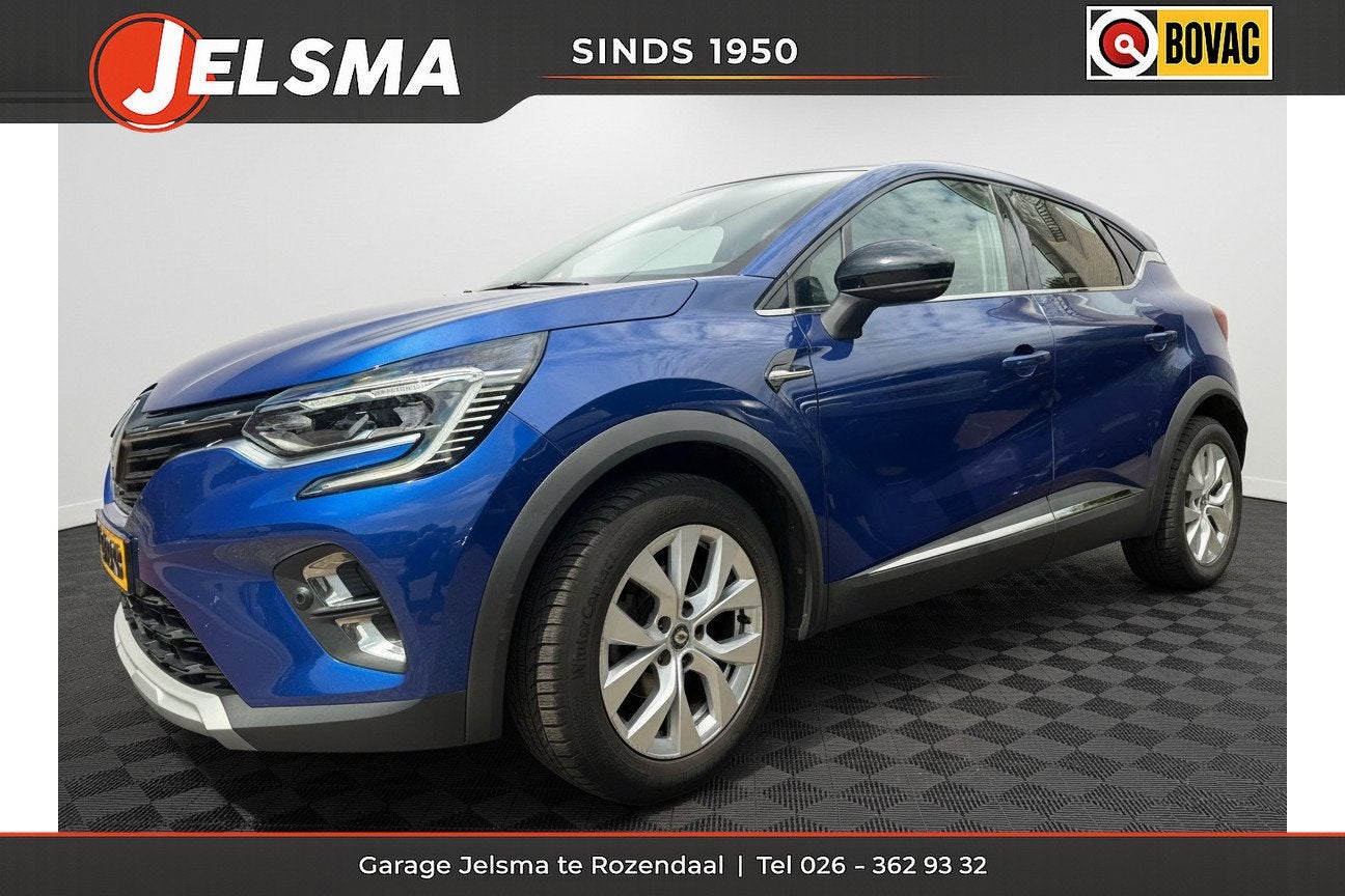 Renault Captur 1.0 TCe 90 Intens, Camera | Navi & CarPlay, Auto's, Gebruikt, Euro 6, Blauw, Leder en Stof