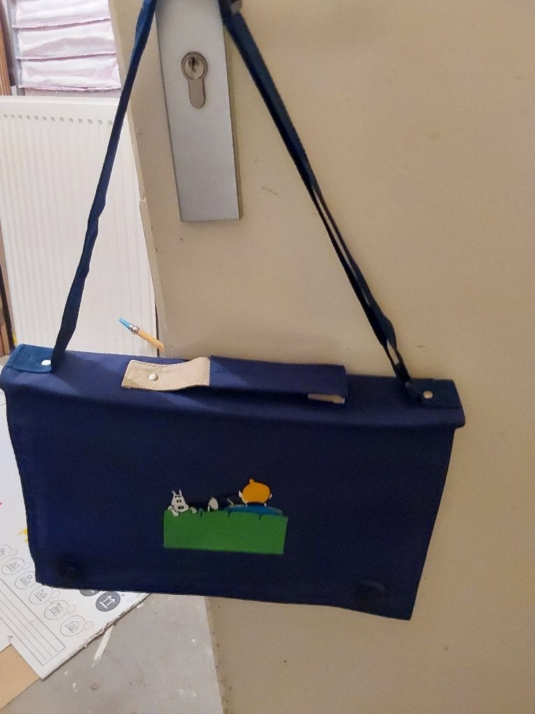 Kuifje tas en spel, Ophalen, Nieuw