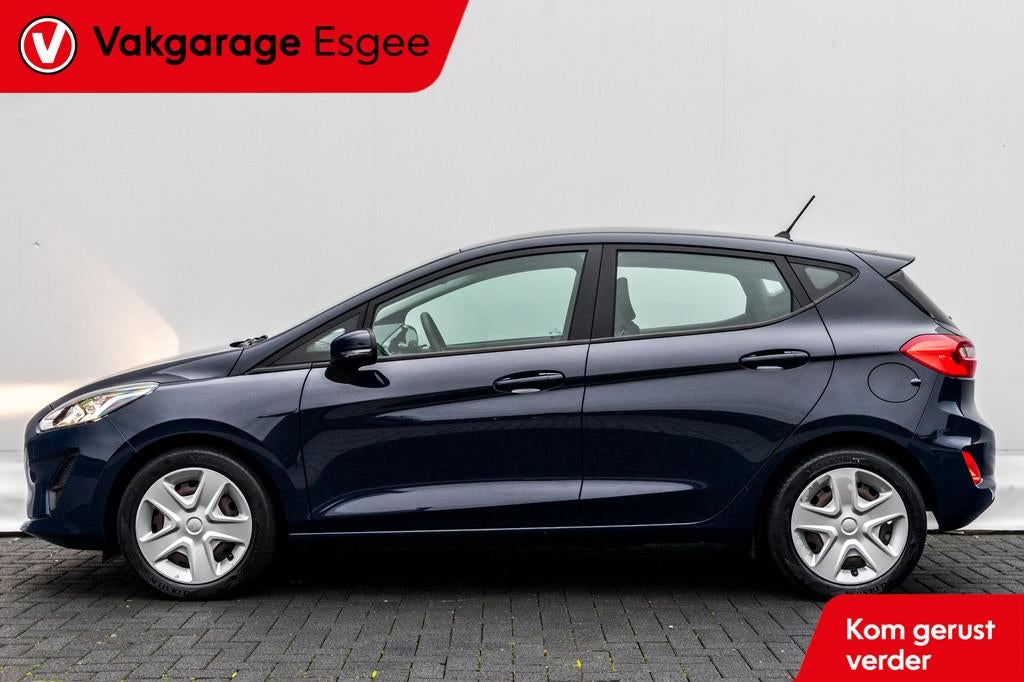 Ford Fiesta 1.1 86 PK Trend | 5 DRS | Airco | Bluetooth | |, Met garantie (alle), Blauw, Lichtsensor, 23 km/l