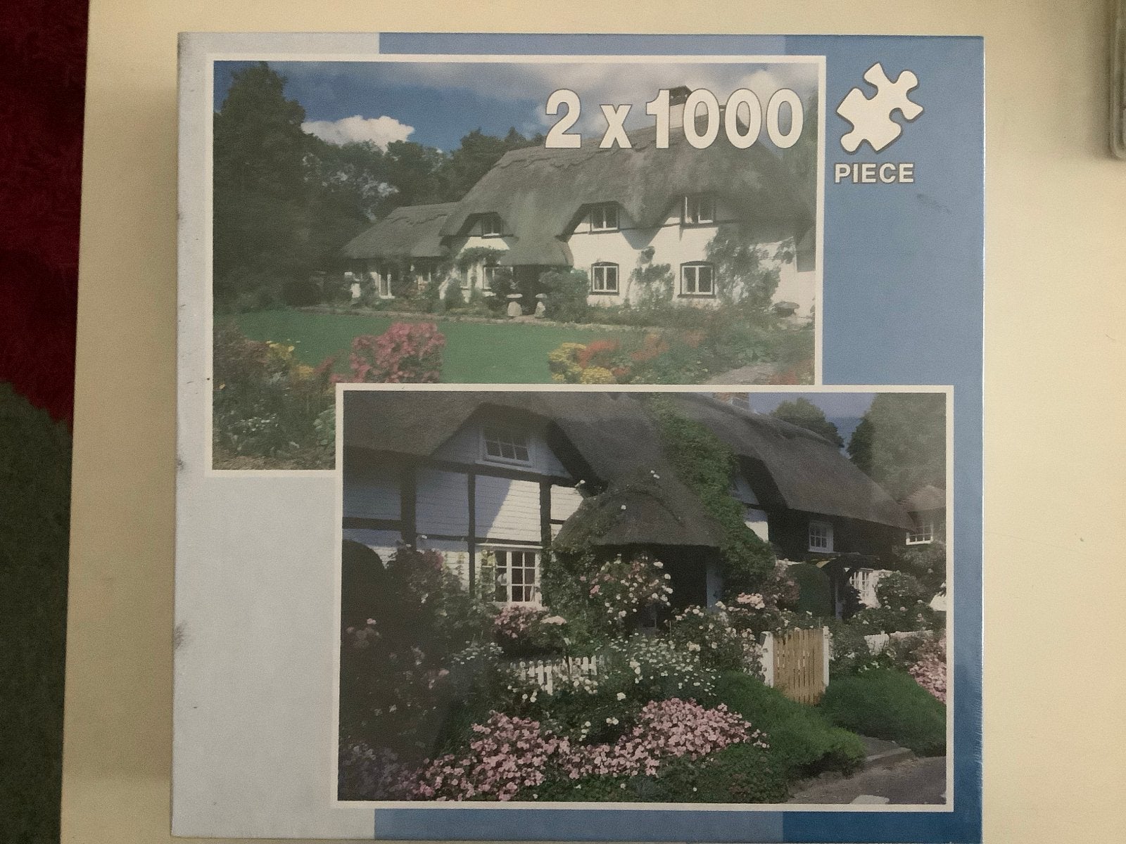 Nieuw in doos: Legpuzzel 2x1000 stukjes - Cottage & Michel, Ophalen of Verzenden, 500 t/m 1500 stukjes, Zo goed als nieuw, Legpuzzel