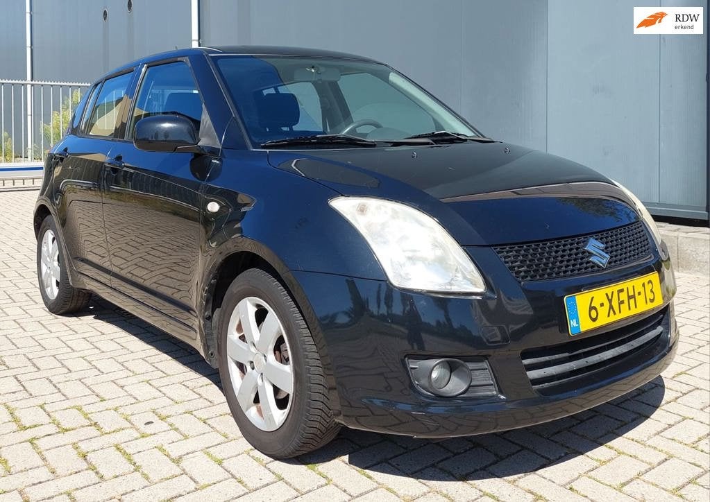 Suzuki Swift 1.3 Base 5 deurs zwart / Airco / Nieuwe APK, Auto's, Voorwielaandrijving, Stof, Zwart, 400 kg
