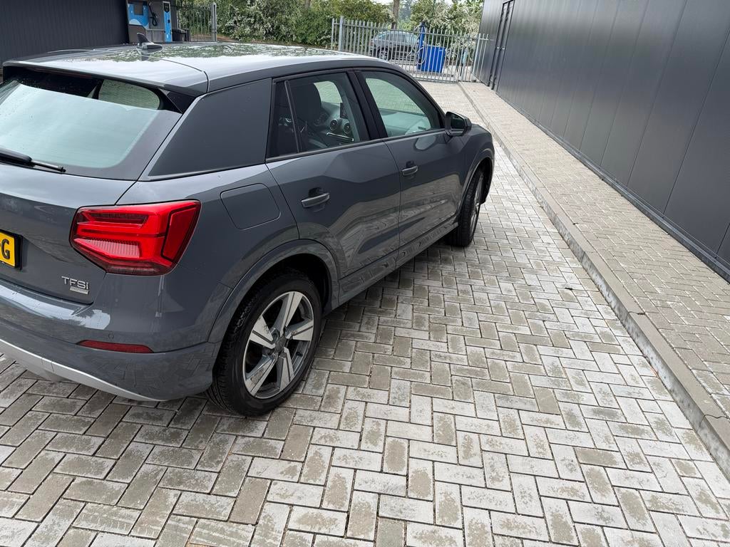 Audi Q2 1.0 Tfsi 116pk S Tronic 2018 Grijs automaat, Auto's, Audi, 650 kg, Particulier, 3 cilinders, SUV of Terreinwagen
