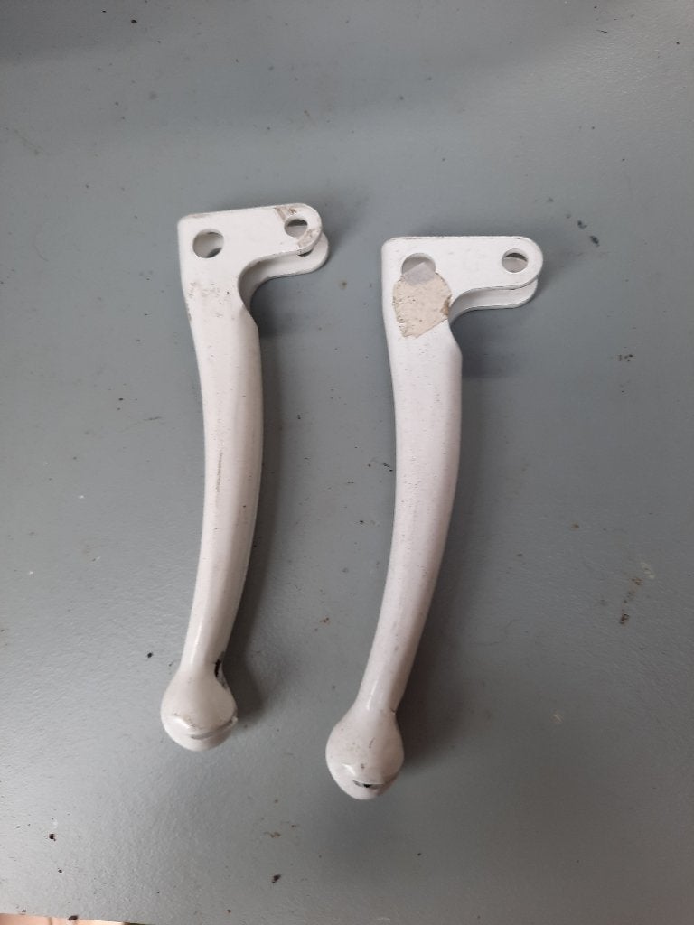 N.O.S set origineel witte grepen knijpers hendels puch maxi, Ophalen, Nieuw, Overige typen, Overige merken