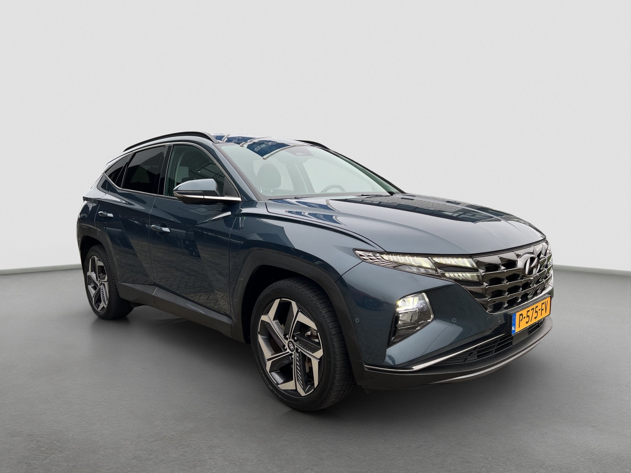 Hyundai Tucson 1.6 T-GDI 265pk PHEV Premium 4WD, Auto's, Automaat, Adaptive Cruise Control, Gebruikt, 4 cilinders