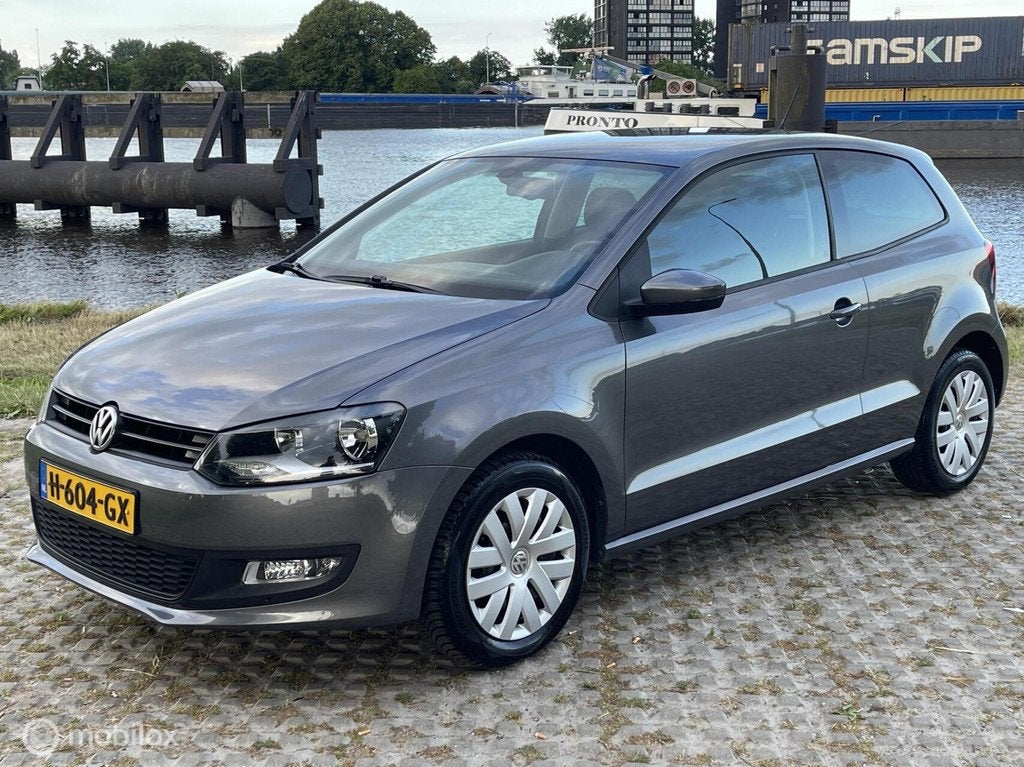 Volkswagen Polo 1.4-16V Highline DSG Airco Cruise Stoelverwa, Auto's, Volkswagen, Euro 5, 86 pk, 4 cilinders, Bedrijf