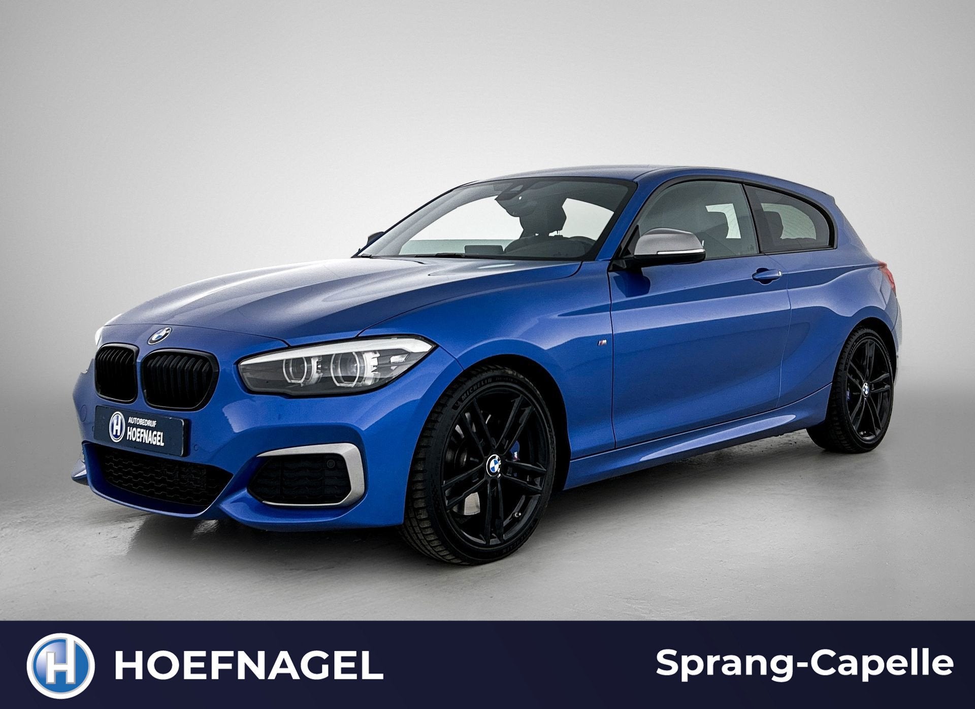 BMW 1-serie M140i xDrive Edition Shadow | Harman/Kardon | St, Auto's, Gebruikt, Zwart, 340 pk, Bedrijf